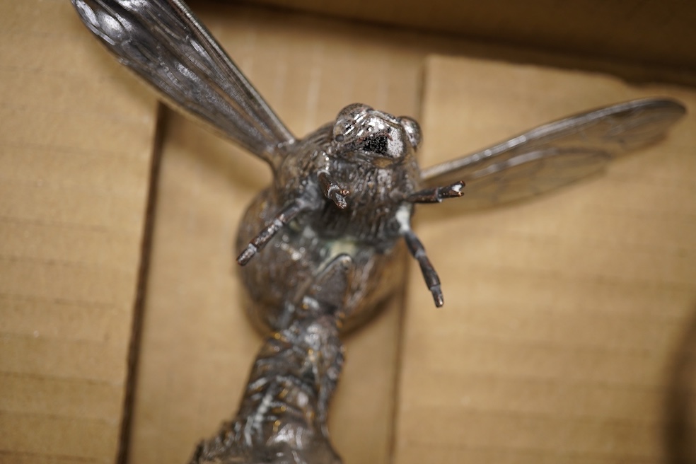 Five animal themed chrome and brass car mascots consisting of a giraffe mounted on a turned aluminium base, a hare, a bumblebee in flight, a leaping fish, and a scorpion. Condition - fair to good.